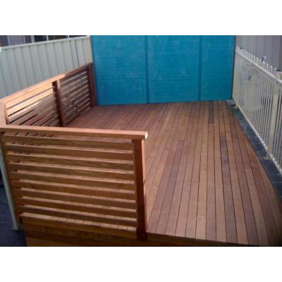 Solid Merbau decking with horizontal merbau slats.