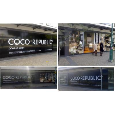 window signage. to promote new store opening and to conceal construction inside.