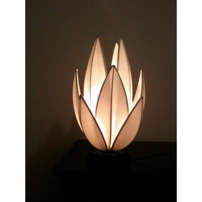 Available in offwhite, red or lemin.Each lamp has a dimmer to create the softest or bright lighting