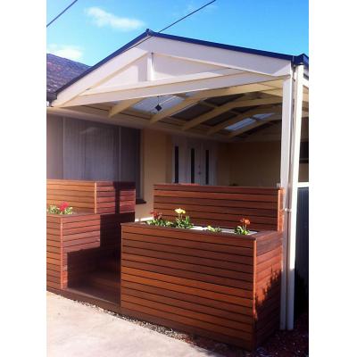 We customised this entrance to encompass planter boxes, with the other side utilised as seats.