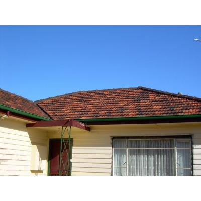 Terracotta roof after
full bed and point, valley replacement and pressure clean