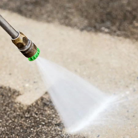 The image features a high-pressure cleaning wand in action, directing a powerful stream of water onto a surface. This signifies the cleaning process, which is pivotal for removing dirt and grime in commercial settings. Such high-pressure washing is crucial for maintaining the cleanliness and appearance of driveways, pavements, and outdoor areas, particularly for businesses in places like Caringbah and surrounding regions. As part of House Cleaning Cronulla’s commercial cleaning services, this method is effective in ensuring that spaces are not only clean but also safe for customers and staff. The image represents the company’s commitment to using efficient equipment to deliver high-quality cleaning results.