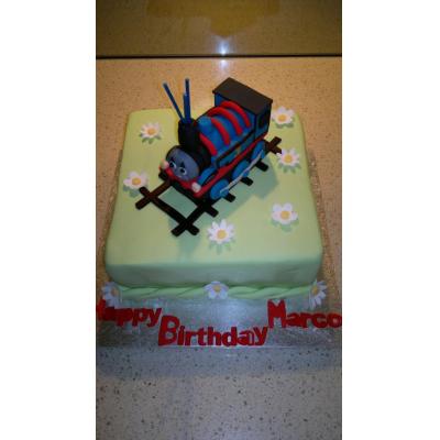 Edible Thomas figurine on a Marble Butter Cake