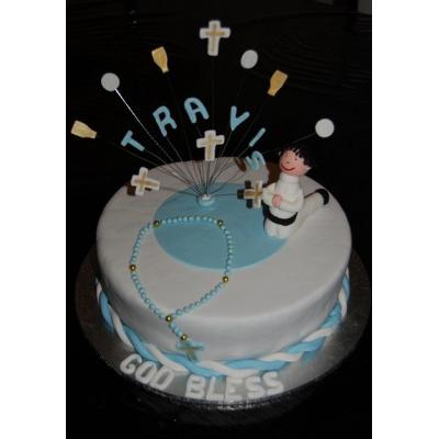 Fondant boy figure for a Holy Communion celebration