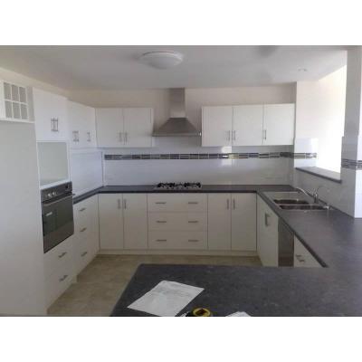 Post form granite look top with contrasting white doors