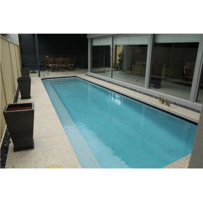 Honed concrete showed featuring decorative perimeter designs