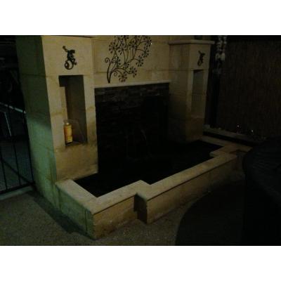 Limestone Fish Pond with a beautiful water feature, Perfect for your entertaining area.