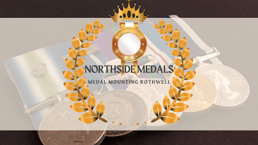 The image prominently features the logo of Northside Medals, which is a trophy shop located in Burpengary, QLD. The logo includes a decorative crown and laurel leaves, symbolising achievement and excellence, which aligns perfectly with the services they provide, including medal mounting. In the background, there are several medals displayed, highlighting the craftsmanship and attention to detail in their products. This visual representation encapsulates the essence of the business, focusing on recognition and awards for various achievements. The overall colour scheme is professional and inviting, reflecting a commitment to quality and service.