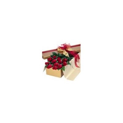 Send a dozen long stemmed roses in a gold gift wrapped.